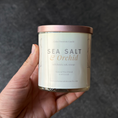 Load image into Gallery viewer, Sea Salt & Orchid scented soy candle in whiskey glass jar