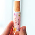 Load image into Gallery viewer, Cedar Mountain Candle Lavender & Spring Apricot Perfume Roller with floral and fruit design. Wooden cap.