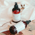 Load image into Gallery viewer, Cedar Mountain Candle 8 oz Starfruit & Mandarin room spray in amber glass bottle with black spray nozzle.