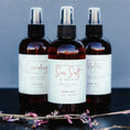 Load image into Gallery viewer, Cedar Mountain Candle 8 oz room spray in Starfruit & Mandarin scent. Amber glass bottle with white label.