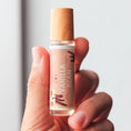 Load image into Gallery viewer, Cedar Mountain Candle Vanilla Bean roll-on perfume oil with vanilla bean illustration and bamboo lid.