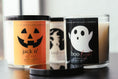 Load image into Gallery viewer, Halloween Candle Collection by Cedar Mountain Candle in 9 oz whiskey glass jars with black lids
