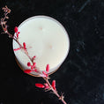 Load image into Gallery viewer, Cedar Mountain Candle 3-wick soy wax candle in glass jar with bamboo lid, topped with red flower sprig.
