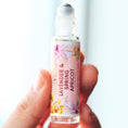 Load image into Gallery viewer, Cedar Mountain Candle Lavender & Spring Apricot Perfume Roller with floral and fruit design. Portable glass bottle with rollerball.
