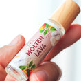 Load image into Gallery viewer, Cedar Mountain Candle Molten Lava roll-on perfume oil with tropical fruit and floral design. 10ml glass bottle with bamboo lid.
