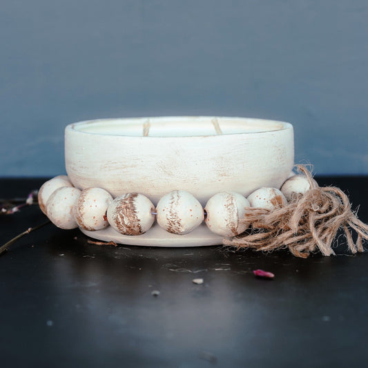 Cedar Mountain Candle white round pottery bowl candle with beaded trim and jute tassel. Natural wax.