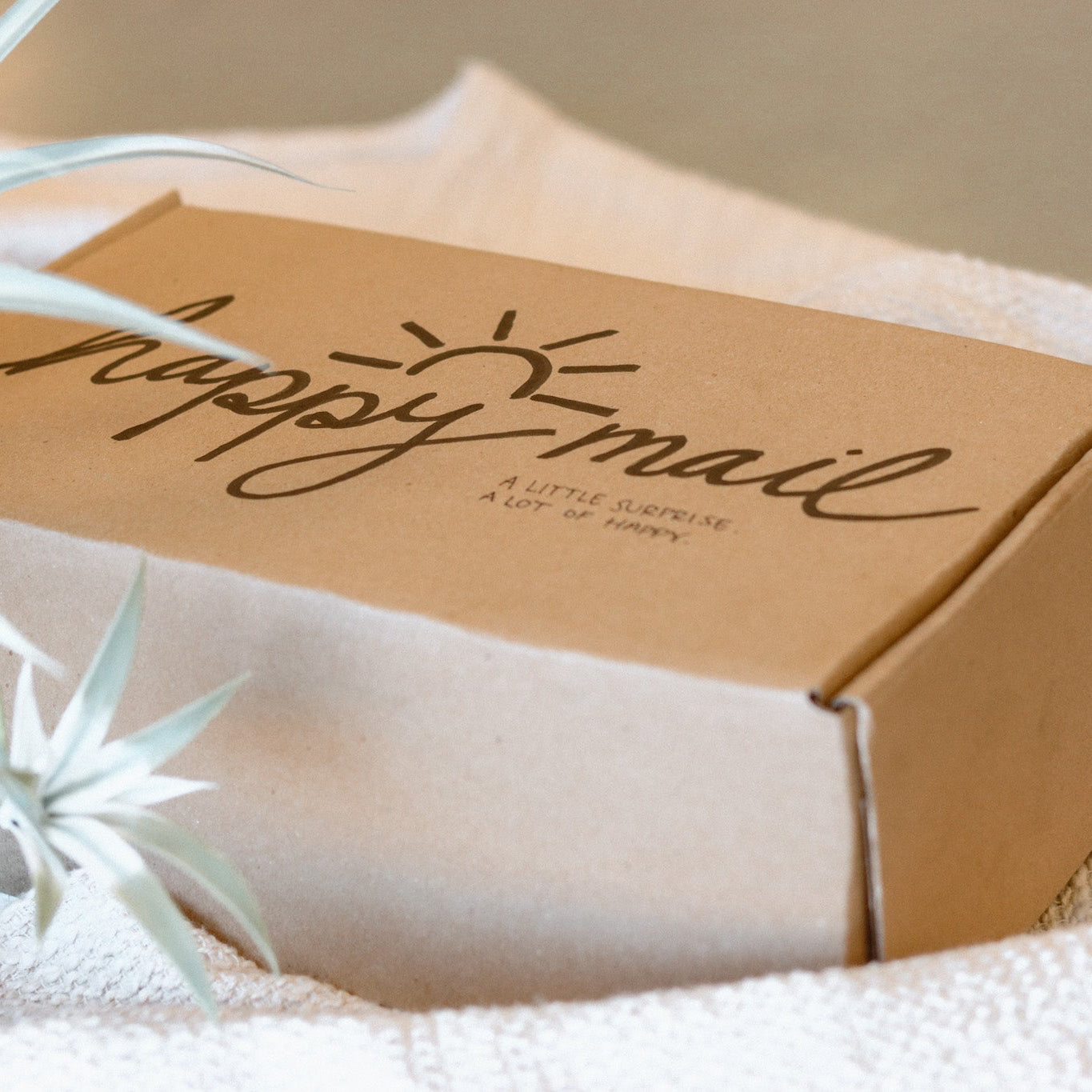 mystery candle box made from cardboard with the words happy mail on top of it