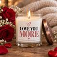 Load image into Gallery viewer, Lit Love You More candle beside red roses
