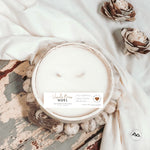 Vanilla Bean Noel farmhouse style handmade round pottery soy candle with beads and tassel by Cedar Mountain Candle